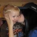 Giving my adorable nephew a kiss on the cheek :D